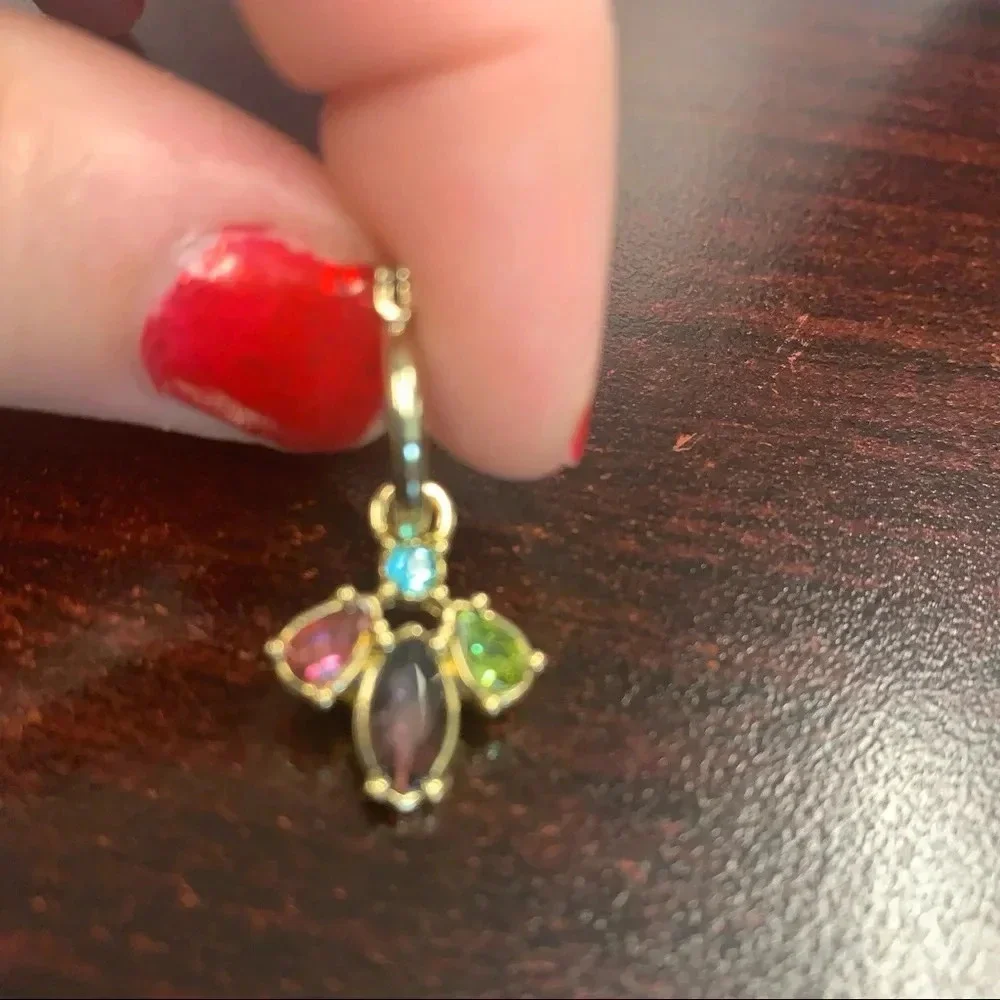 Avon butterfly jeweled hoop earrings NIB